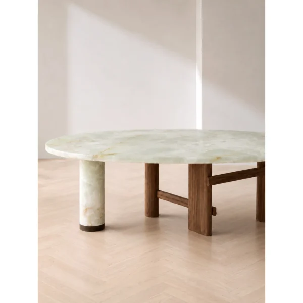 Sengu Jade Stone Round Table on Wood and Stone Base in olive — in a room setting
