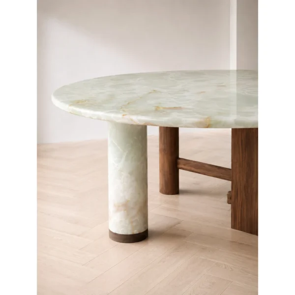 Sengu Jade Stone Round Table on Wood and Stone Base in olive — in a room setting