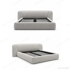 Seville Rounded Upholstered Bed in oatmeal — in a room setting