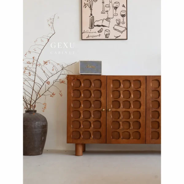 Patchwork Veneer Low TV Cabinet on Black Frame in clay — in a room setting