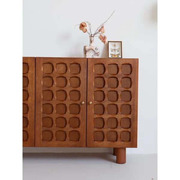 Gexu Walnut Sideboard with Carved Circle-in-Square Doors in walnut — in a room setting