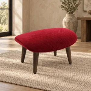 Red Quilted Velvet Footstool with Tapered Wood Legs in red — front view