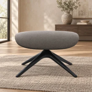 Grey Fabric Footstool on Sculptural Black Wood Base in slate — front view