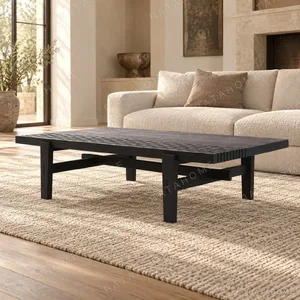 Black Veneer Coffee Table with Open Frame Base in black — in a room setting