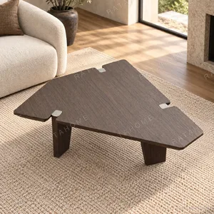 Angular Dark Veneer Coffee Table with Blade Legs in walnut — in a room setting