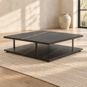 Black Marble Two-Tier Coffee Table with Metal Base in black — in a room setting