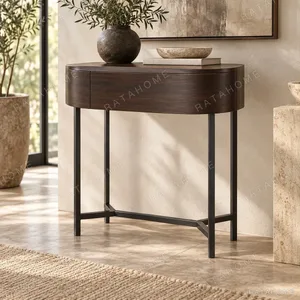 Round Walnut Veneer Side Table with Black Metal Base in walnut — in a room setting