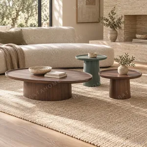 Walnut Round Nesting Coffee Tables, Set of 3 in walnut — in a room setting