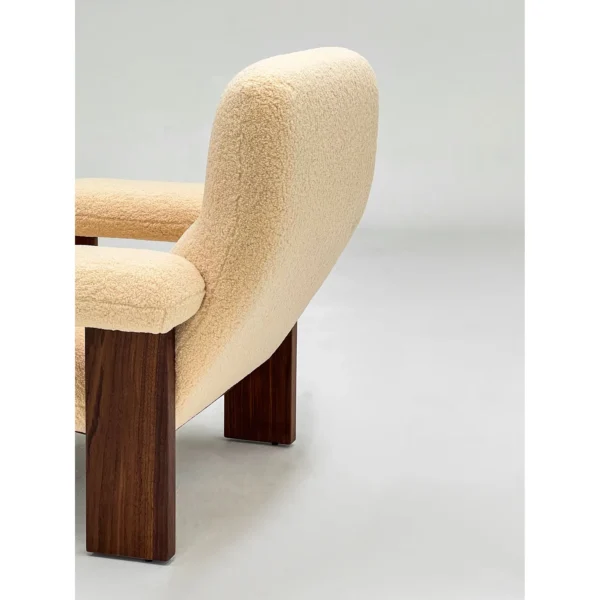 Sherpa Lounge Chair with Ottoman on Dark Solid Wood Frame in sand — in a room setting