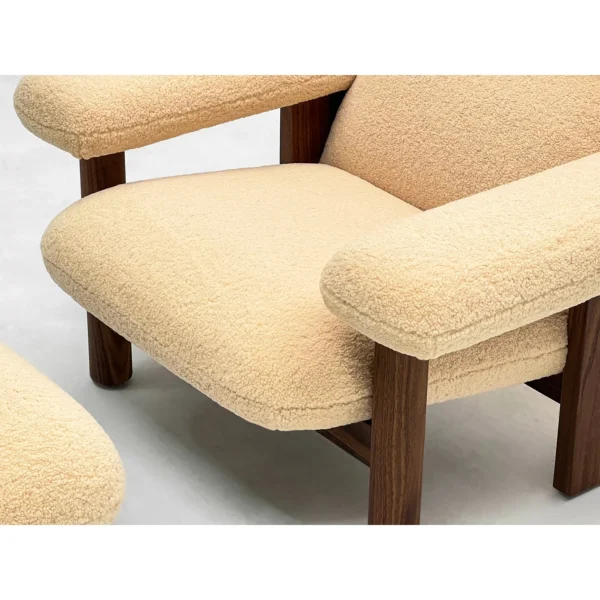 Sherpa Lounge Chair with Ottoman on Dark Solid Wood Frame in sand — in a room setting