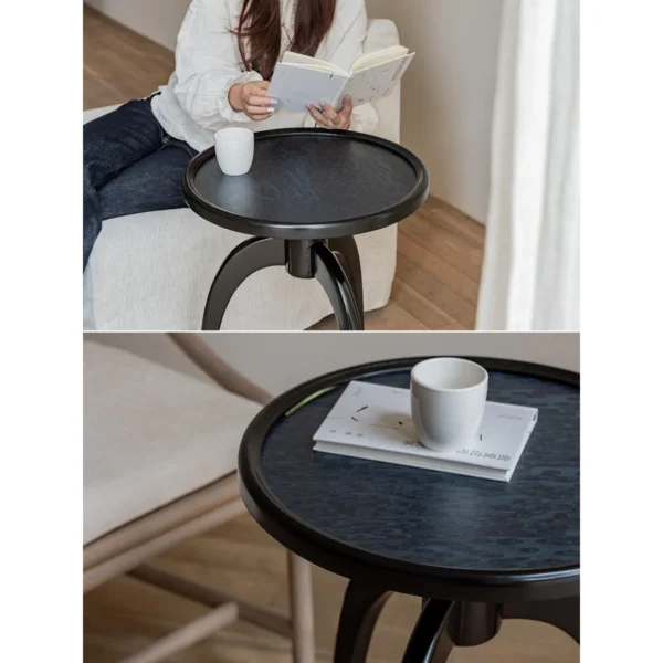 Shinian Black Tripod Side Table with Bird's Eye Top in black — in a room setting
