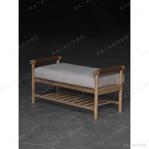 Oak Entryway Bench with Bolster Arms and Slatted Shelf in natural oak — in a room setting