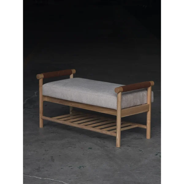 Oak Entryway Bench with Bolster Arms and Slatted Shelf in natural oak — in a room setting