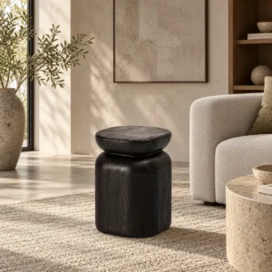 Zenko Black Vessel-Shaped Side Table in black — in a room setting