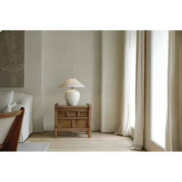 Weathered Wood Small Cabinet with Stepped-Pull Drawers in natural oak — in a room setting