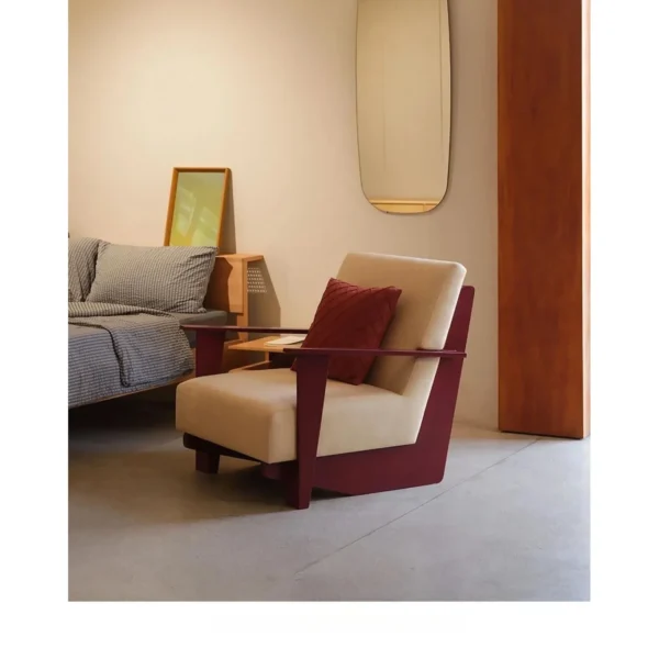 Oak and Teak Frame Armchair in burgundy — in a room setting