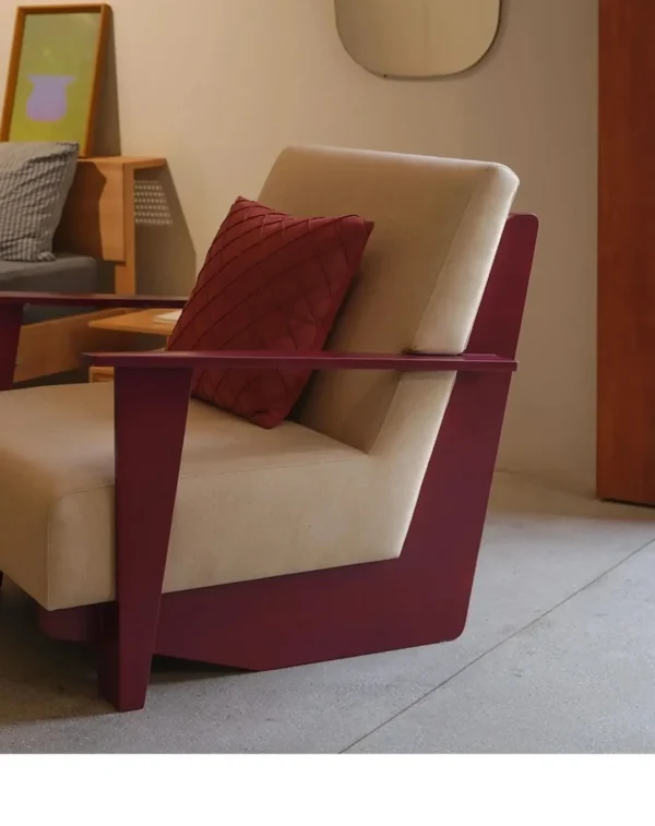 Oak and Teak Frame Armchair in burgundy — in a room setting