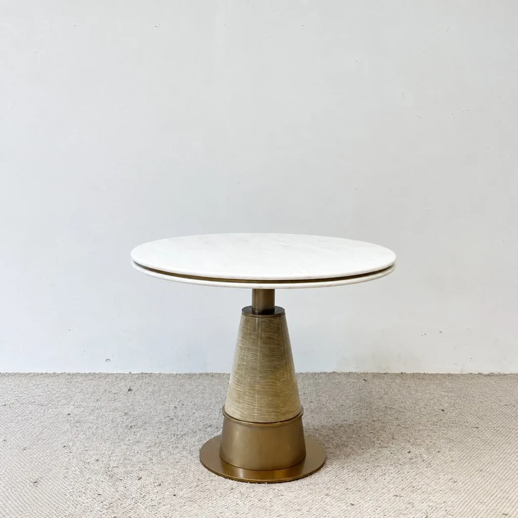 White Stone Round Table on Textured Brass Cone Base in ivory — front view