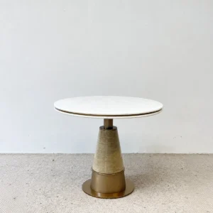 White Stone Round Table on Textured Brass Cone Base in ivory — front view