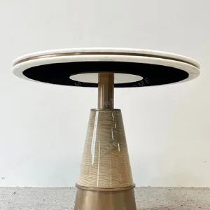 White Stone Round Table on Textured Brass Cone Base in ivory — detail
