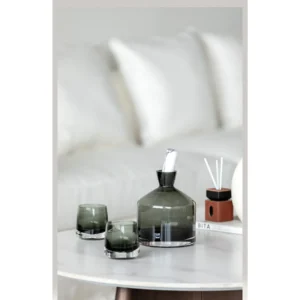 Smoked Green Glass Decanter and Whisky Tumbler Set in olive — in a room setting