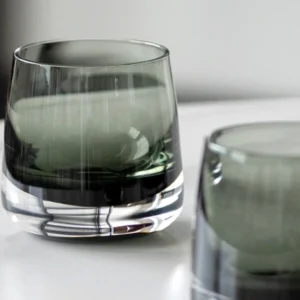 Smoked Green Glass Decanter and Whisky Tumbler Set in olive — in a room setting