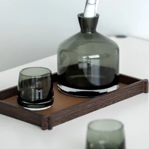 Smoked Green Glass Decanter and Whisky Tumbler Set in olive — in a room setting