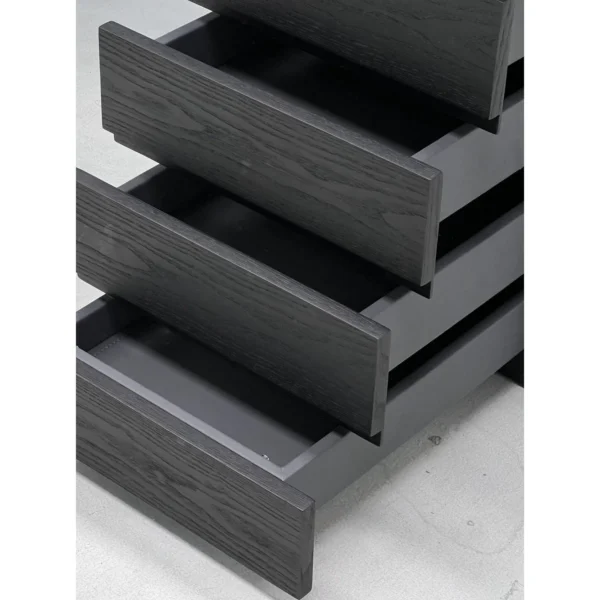 Smoked Wood Wing-Frame Desk in black — in a room setting