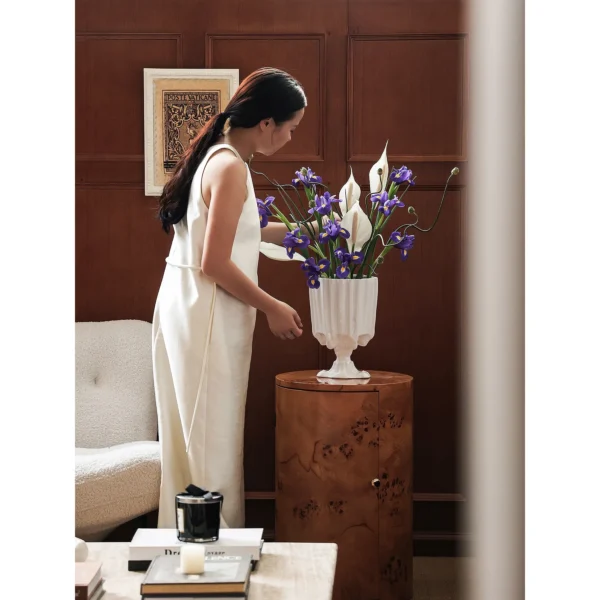 Snow Mountain Ivory Ribbed Footed Vase with Drop Detail in oatmeal — in a room setting