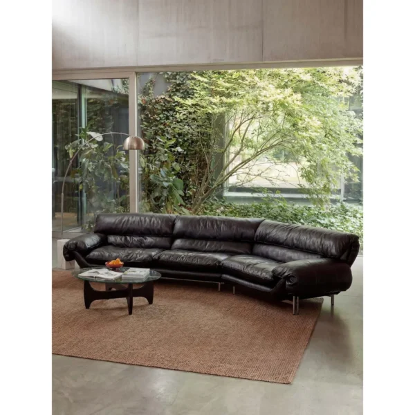 Snow Top Down-Filled Leather Sofa with Eastern Eave Lines in black — in a room setting