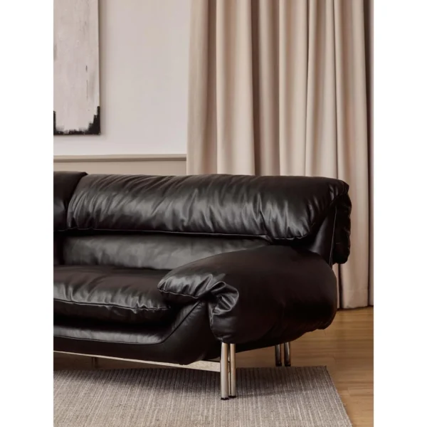 Snow Top Down-Filled Leather Sofa with Eastern Eave Lines in black — in a room setting