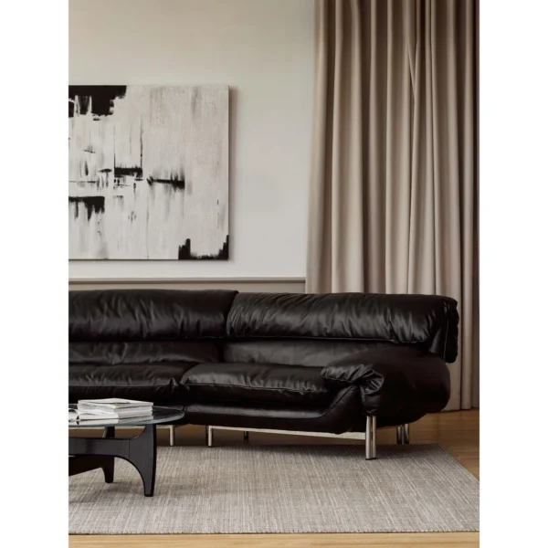 Snow Top Down-Filled Leather Sofa with Eastern Eave Lines in black — in a room setting