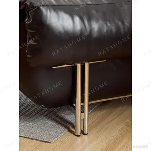 Snow Top Down-Filled Leather Sofa with Eastern Eave Lines in black — in a room setting