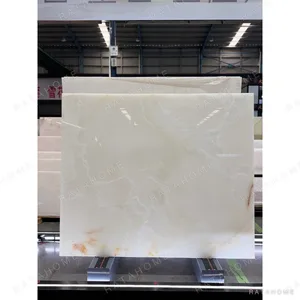 Snow White Marble Fireplace Surround in ivory — in a room setting