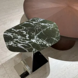 Green Marble Hexagonal Side Table on Black Cantilever Base in olive — in a room setting