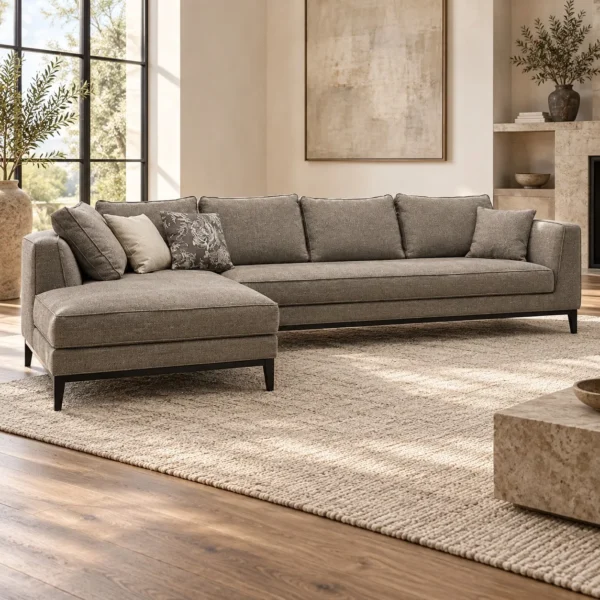 Grey Fabric L-Shaped Sectional with Chaise on Black Legs in slate — in a room setting
