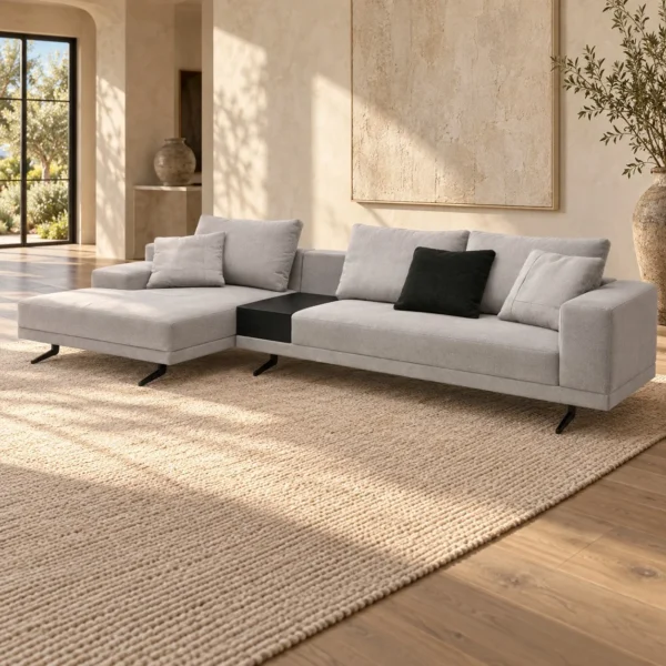 Light Grey Sectional with Chaise and Black Side Table in slate — in a room setting