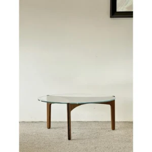 Clear Glass Coffee Table on Walnut Triangular Base in walnut — front view