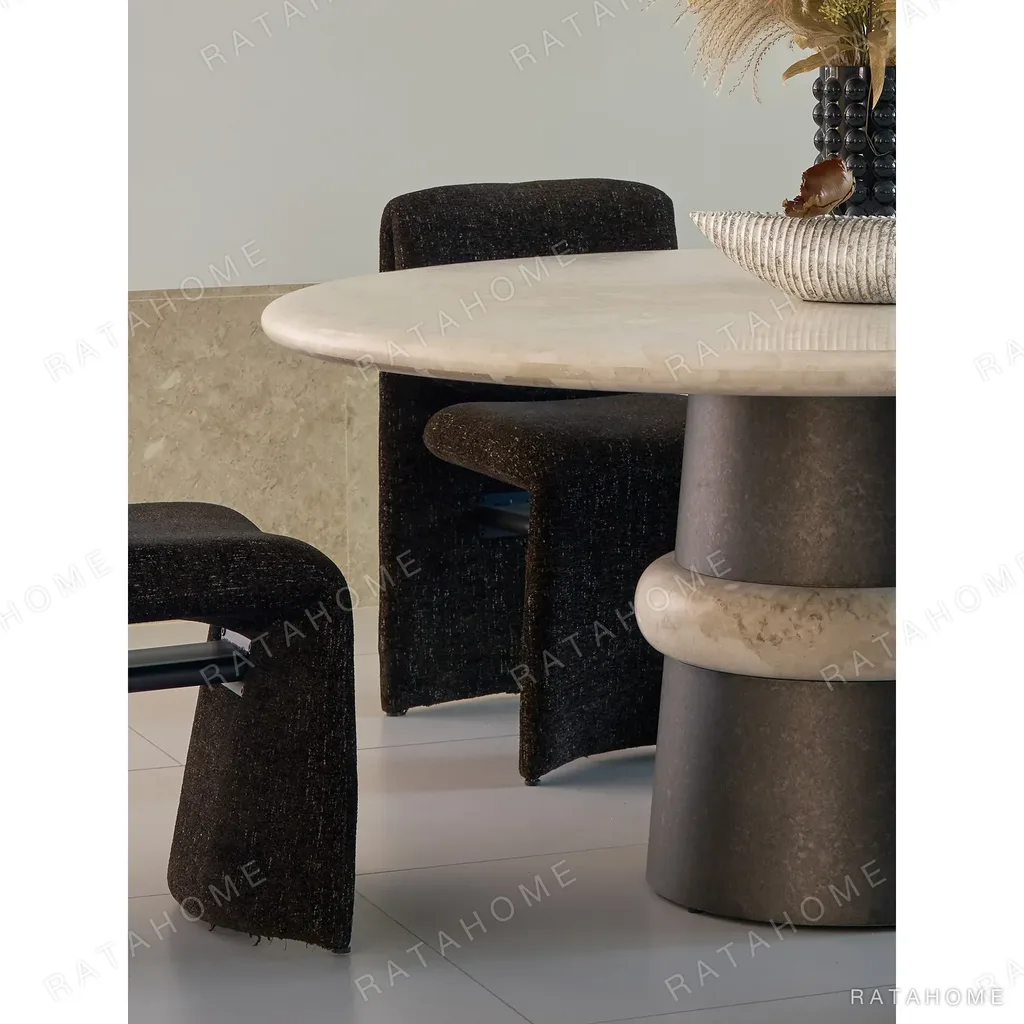 Soft-Light Travertine Round Table in oatmeal — in a room setting
