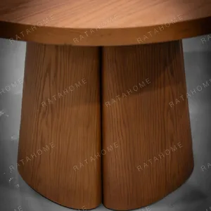 Soft-Line Round Dining Table on Fluted Petal Base in clay — detail