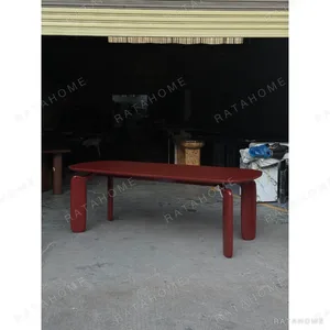 Burgundy Lacquer Dining Table with Rounded Legs in burgundy — in a room setting