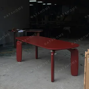 Burgundy Lacquer Dining Table with Rounded Legs in burgundy — in a room setting