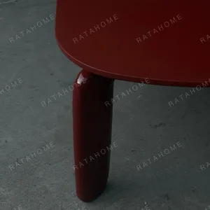 Burgundy Lacquer Dining Table with Rounded Legs in burgundy — detail