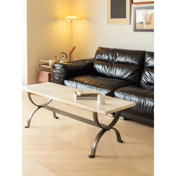 Mid-Century Stone Top Coffee Table on Curved Metal Base in oatmeal — in a room setting