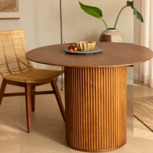 Mango Wood Round Dining Table on Fluted Drum Base in clay — front view