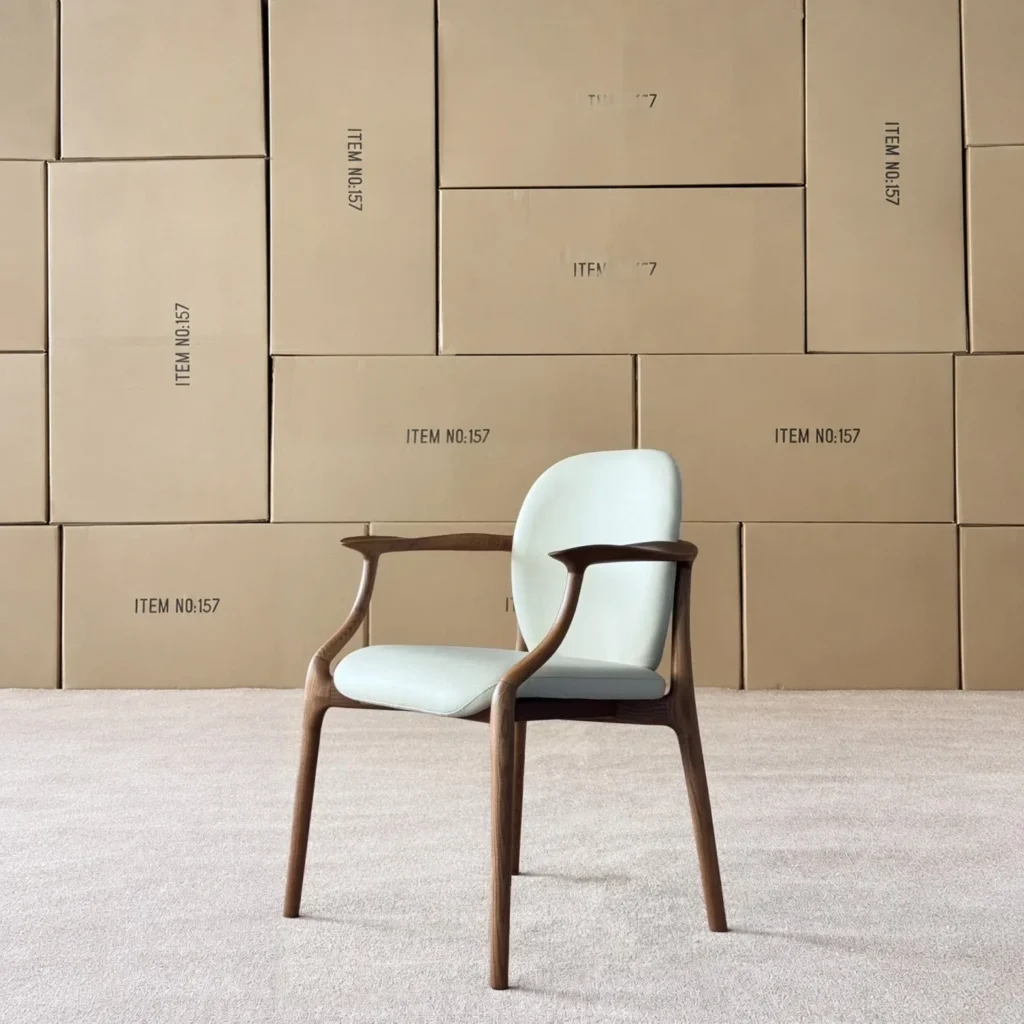 Ash Dining Armchair with Hand-Shaped Arms and Pale Leather in walnut — front view