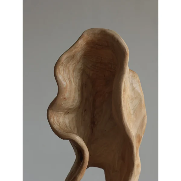 Hand-Carved Camphor Wood Twisting Floor Sculpture in natural oak — in a room setting
