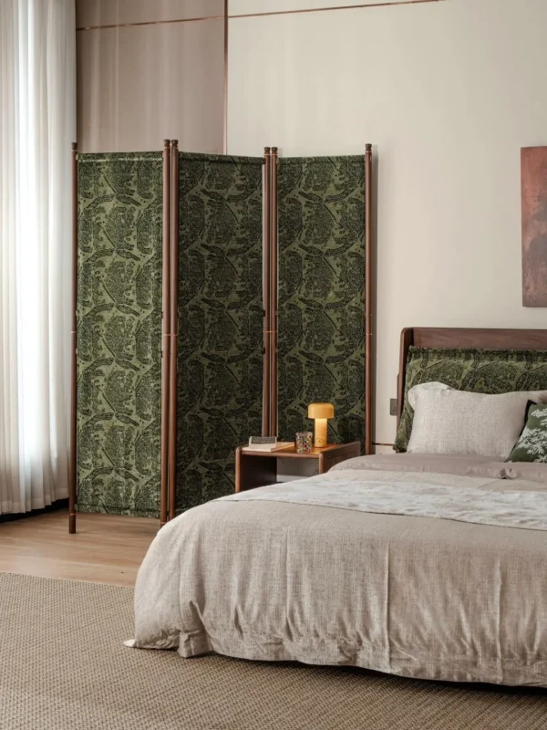 Solid Wood Folding Screen with Patterned Fabric Panels in olive — in a room setting