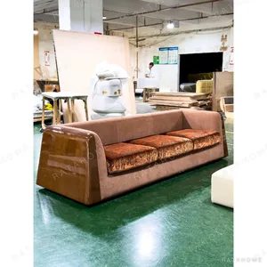 Vintage Pattern Sofa in rose stone — in a room setting