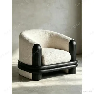 Smoked Solid Wood Sculptural Tub Chair in Cream Bouclé — in a room setting